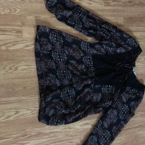 A large Maurice’s long sleeve shirt